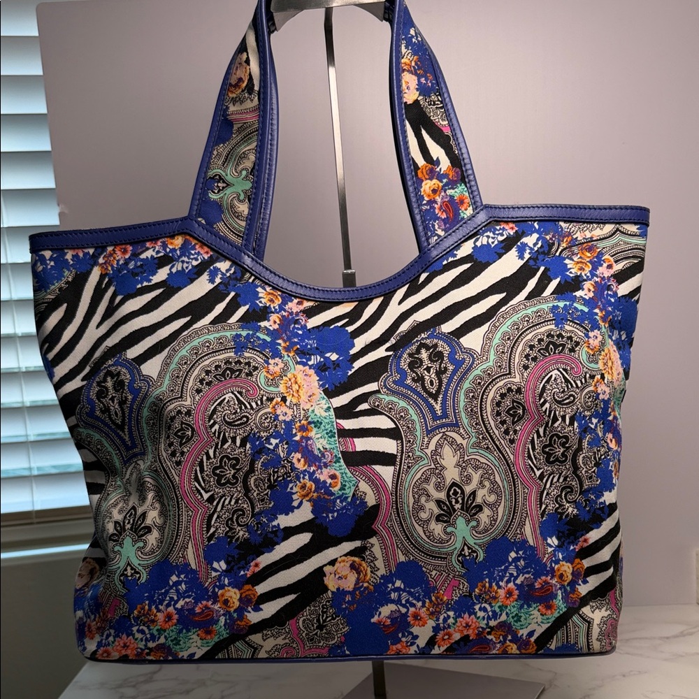 ETRO Libra tote bag featuring vibrant, eclectic mix of patterns including  paisl